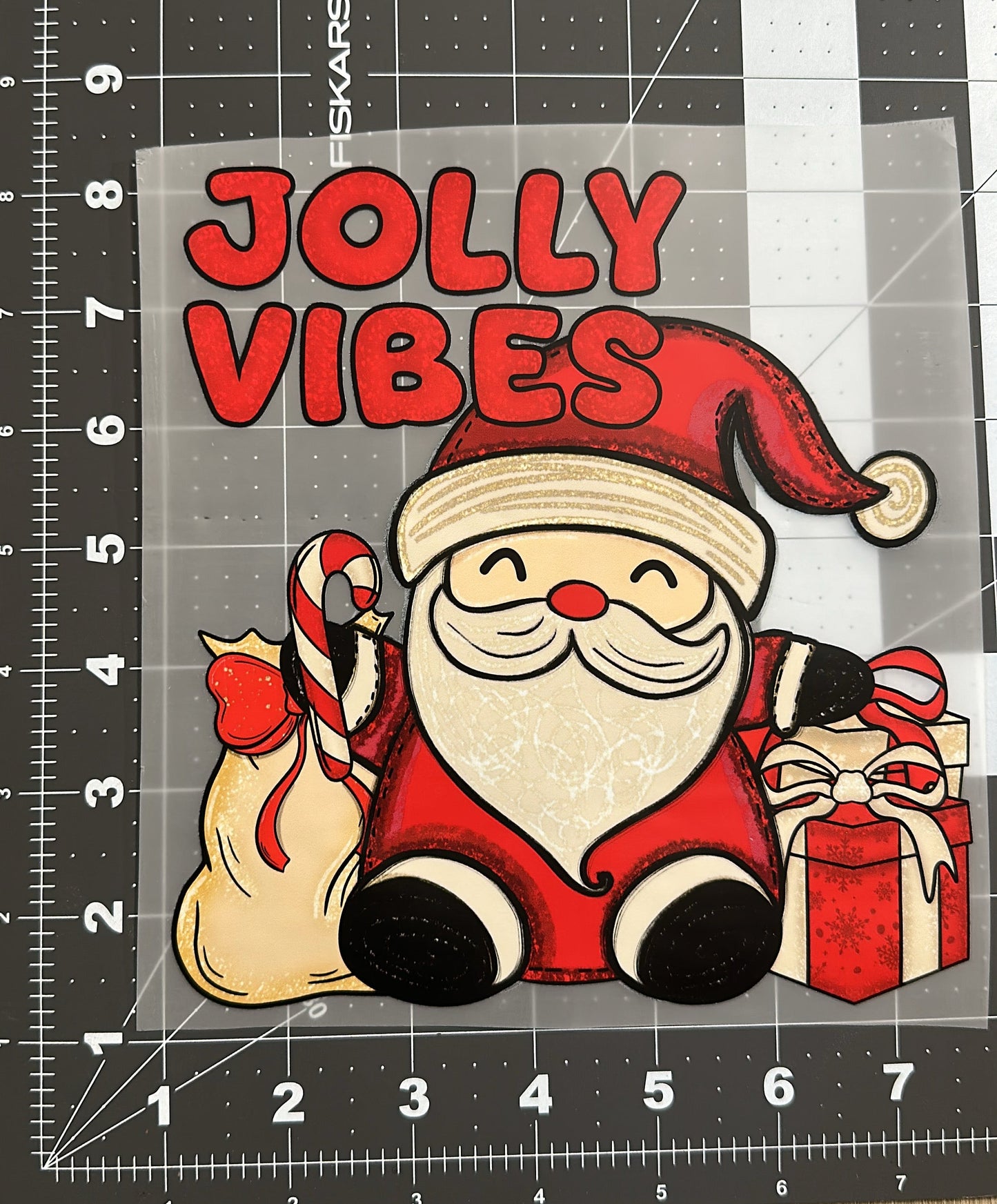 dtf transfer that says "jolly vibes" in child's size
